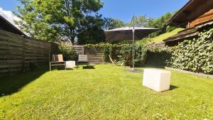 Appartements Le Grenier 1821 - Mini chalet - Centre village - AravisTour : photos des chambres