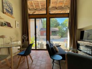Appartements La cour des secrets-gitesdanslain : photos des chambres
