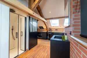 Appartements Evasion chic, spa et sauna sous les toits : photos des chambres