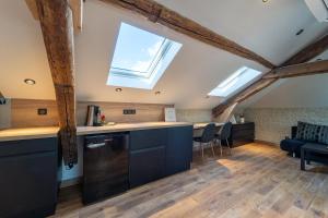 Appartements Evasion chic, spa et sauna sous les toits : photos des chambres