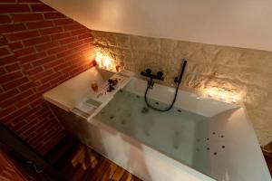 Appartements Evasion chic, spa et sauna sous les toits : photos des chambres