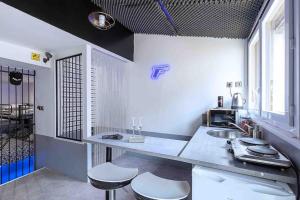 Appartements 50 nuances de gris - BDSM - Loveroom : photos des chambres
