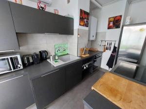 Appartement avec terrasse en plein centre-ville