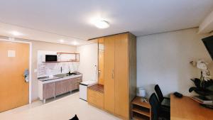 1007 Hotel Bienal Suits, Arrumação, manobrista e piscina