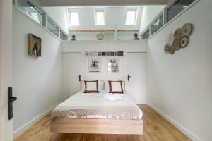 Appartements Maison de reve proche metro et RER : photos des chambres
