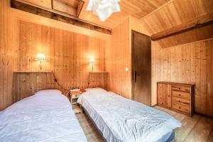 Chalets Demi-Chalet Les Trolles 6-8 pers : photos des chambres