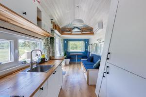 Blue Tiny House with HotTub