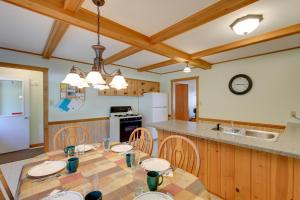 Eagle River Apartment with Private Dock and Fire Pit!