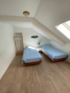 Appartements Appartement duplex Luc sur Mer, en face de la plage : photos des chambres