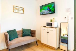 Appartements La petite Chambord aux portes du chateau : photos des chambres