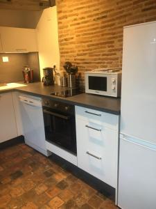 Appartements Studio atypique : photos des chambres