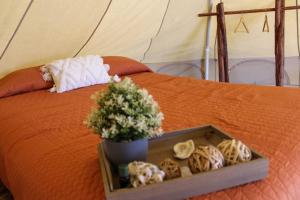 RUSTICO LOUNGE-Tipi With AC in front of the beach