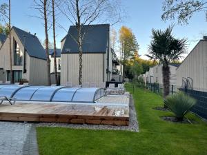 Apartamentai su baseinu