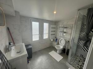 Appartements Appartement Champagne sur Seine : photos des chambres