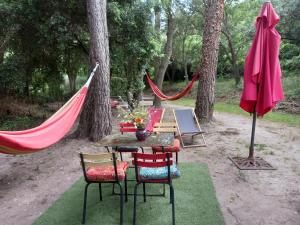 Tentes de luxe La roulotte du petit paradis : photos des chambres