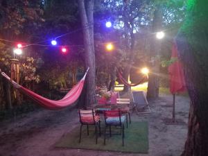 Tentes de luxe La roulotte du petit paradis : photos des chambres