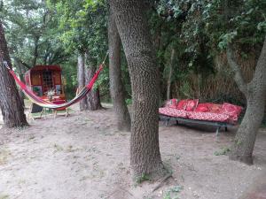 Tentes de luxe La roulotte du petit paradis : photos des chambres