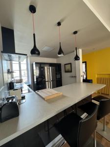 Appartements Chez Flo - Appartement Luxueux - Hypercentre : photos des chambres