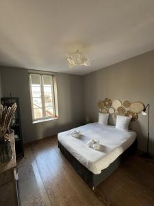 Appartements Chez Flo - Appartement Luxueux - Hypercentre : photos des chambres