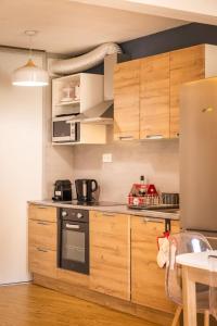 Appartements Le Sarladais - Coeur de Sarlat : photos des chambres