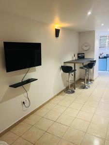 Appartements Charmant studio : photos des chambres