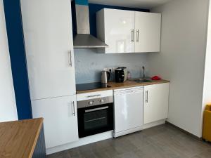 Appartements Charmant studio avec terrasse : photos des chambres
