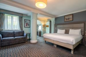 Superior Family Room with One King Bed and Sofa Bed - Non-Smoking room in London Chigwell Prince Regent Hotel BW Signature Collection