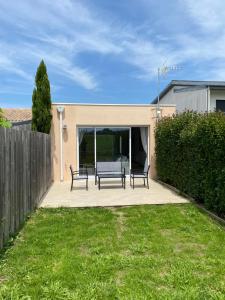 Villas Maison moderne avec jardin : photos des chambres