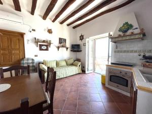 Il Balcone sul molo di Malfa