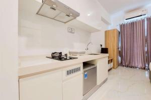 Great Deal and Comfortable Studio at Sky House BSD Apartment By Travelio