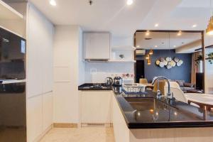 Good and Homey 1BR at Branz BSD City Apartment By Travelio