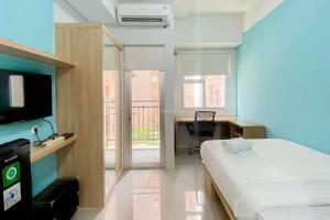 Minimalist Studio Apartment at Transpark Juanda Bekasi Timur By Travelio