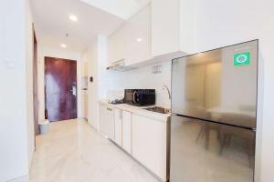 Good Deal and Comfy 2BR Sky House BSD Apartment By Travelio