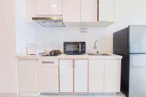 Good Deal and Comfy 2BR Sky House BSD Apartment By Travelio