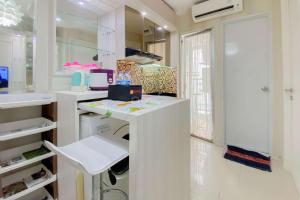 Comfortable and Homey 2BR at Bassura City Apartment By Travelio