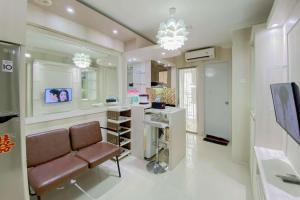 Comfortable and Homey 2BR at Bassura City Apartment By Travelio