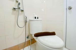 Comfortable and Homey 2BR at Bassura City Apartment By Travelio