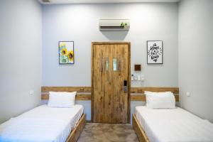 Phòng 4 người có phòng tắm chung (Quadruple with Shared Bathroom)