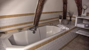 Appartements Maison Melrose : photos des chambres