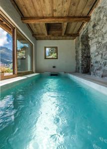 Chalet Dolomites Luxe con Spa, Piscine, Jacuzzi e Cinema Privato