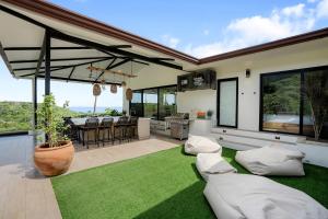 Luxe Tropical Villa with Sparkling Infinity Pool, Panoramic Ocean Views & Community Amenities