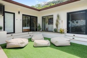 Luxe Tropical Villa with Sparkling Infinity Pool, Panoramic Ocean Views & Community Amenities