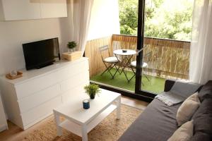 Appartements Le Petit Moulin : photos des chambres