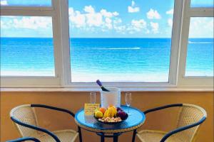 Beachfront Getaway Private Balcony & Scenic Views