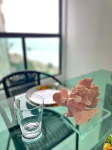 W703 · Requinte, vista e luxo a beira-mar