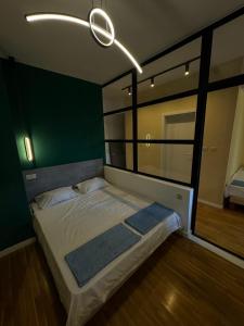 Gigi Apartment by eluxory