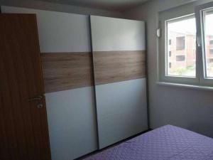Apartments with parking space Palit, Rab - 23237