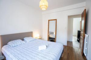 Appartements Appartement T3 avec jardin : photos des chambres