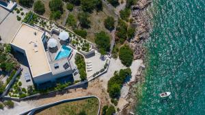 Luxury Seafront Villa Roots with private, heated pool, 5 en-suite bedrooms, enchanting sea views