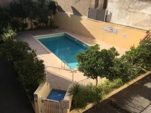 Studio cabine dans résidence avec piscine